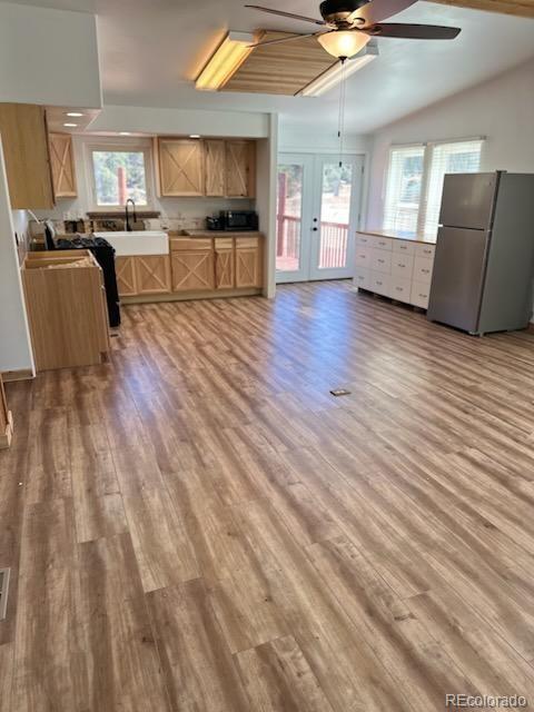 7878 Copper Gulch Road Cotopaxi, CO 81223 - Photo 14 of 17 a living room with furniture and a flat screen tv
