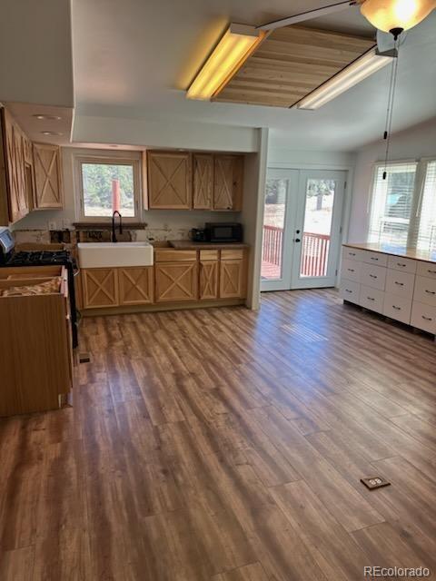 7878 Copper Gulch Road Cotopaxi, CO 81223 - Photo 16 of 17 a living room with furniture and a wooden floor