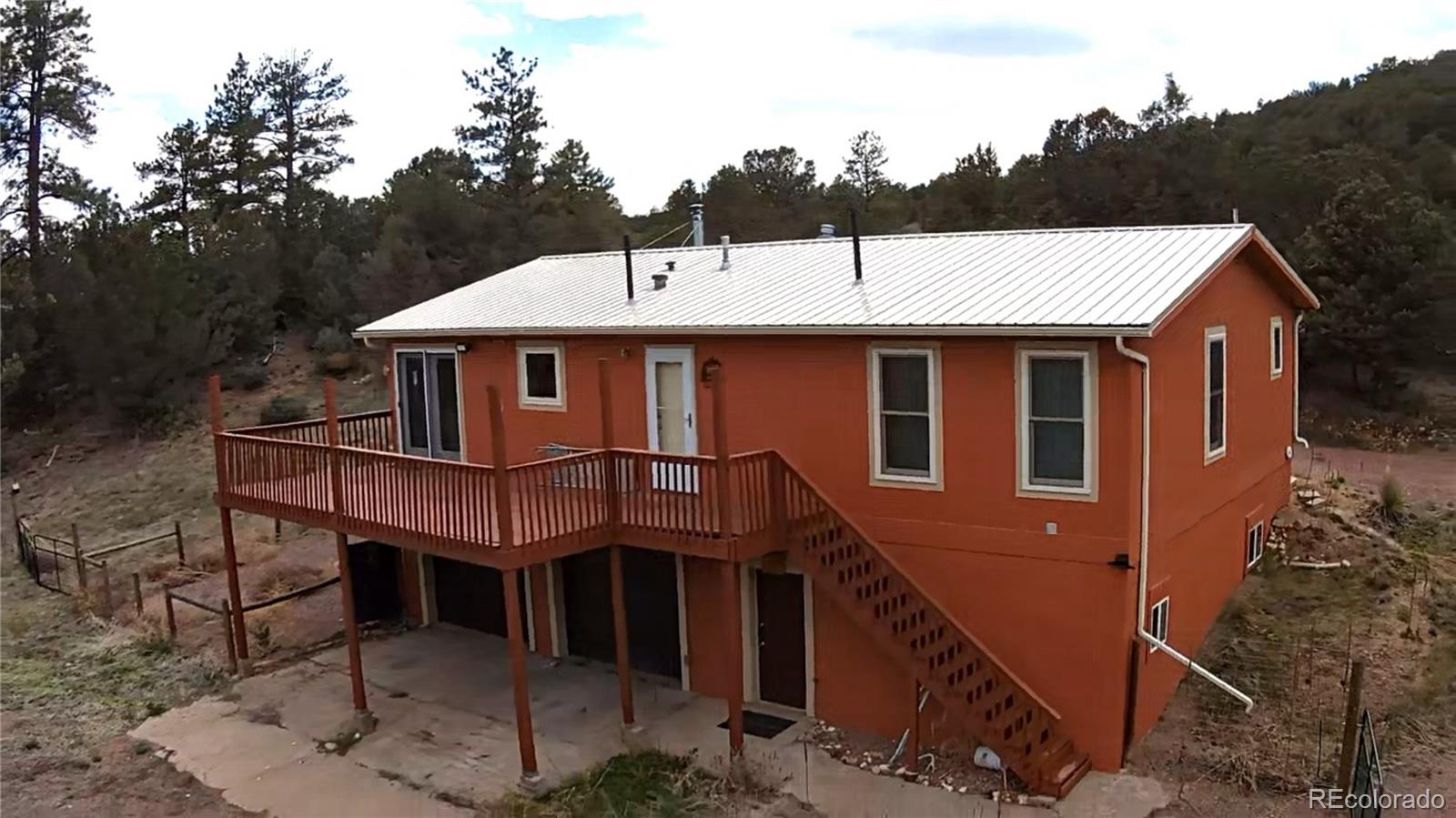 7878 Copper Gulch Road Cotopaxi, CO 81223 - Photo 5 of 17 a aerial view of a house with a yard