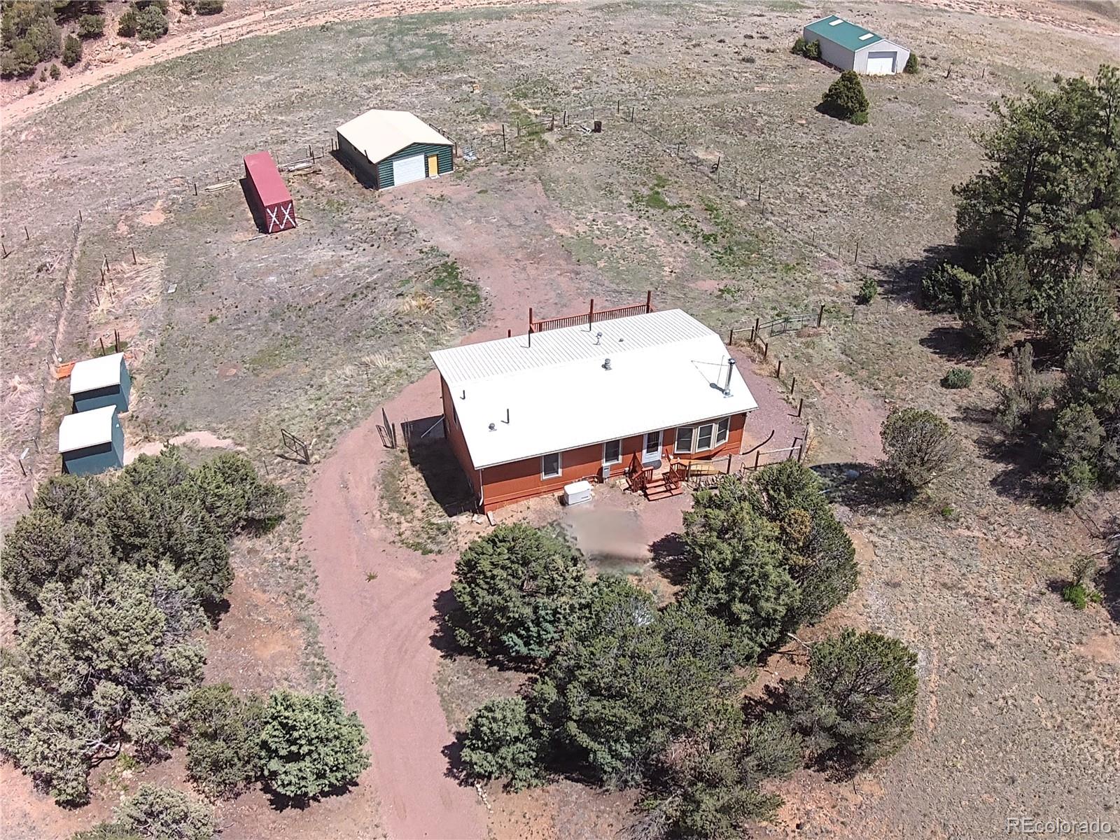 7878 Copper Gulch Road Cotopaxi, CO 81223 - Photo 7 of 17 an aerial view of a house with a yard