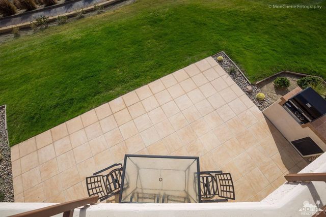 a view of a street with a yard