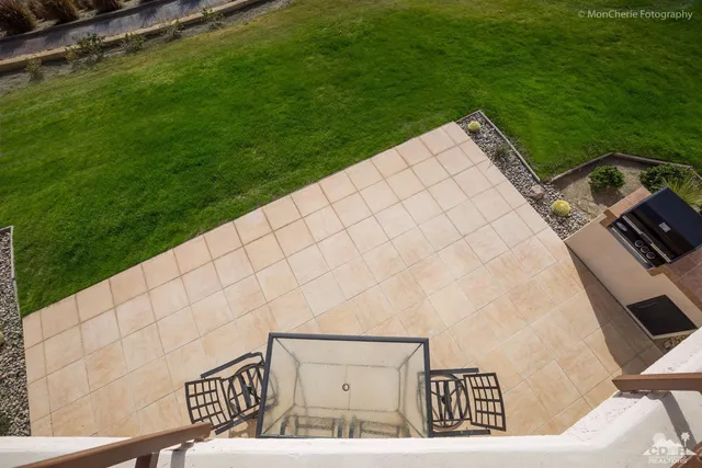 a view of a street with a yard