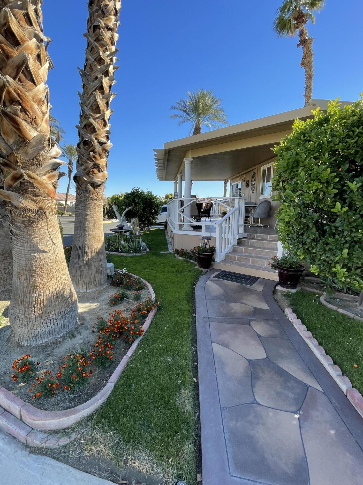 81620 Ave 49, Unit 1A Indio, CA 92201 - Photo 15 of 20 a view of a porch with furniture