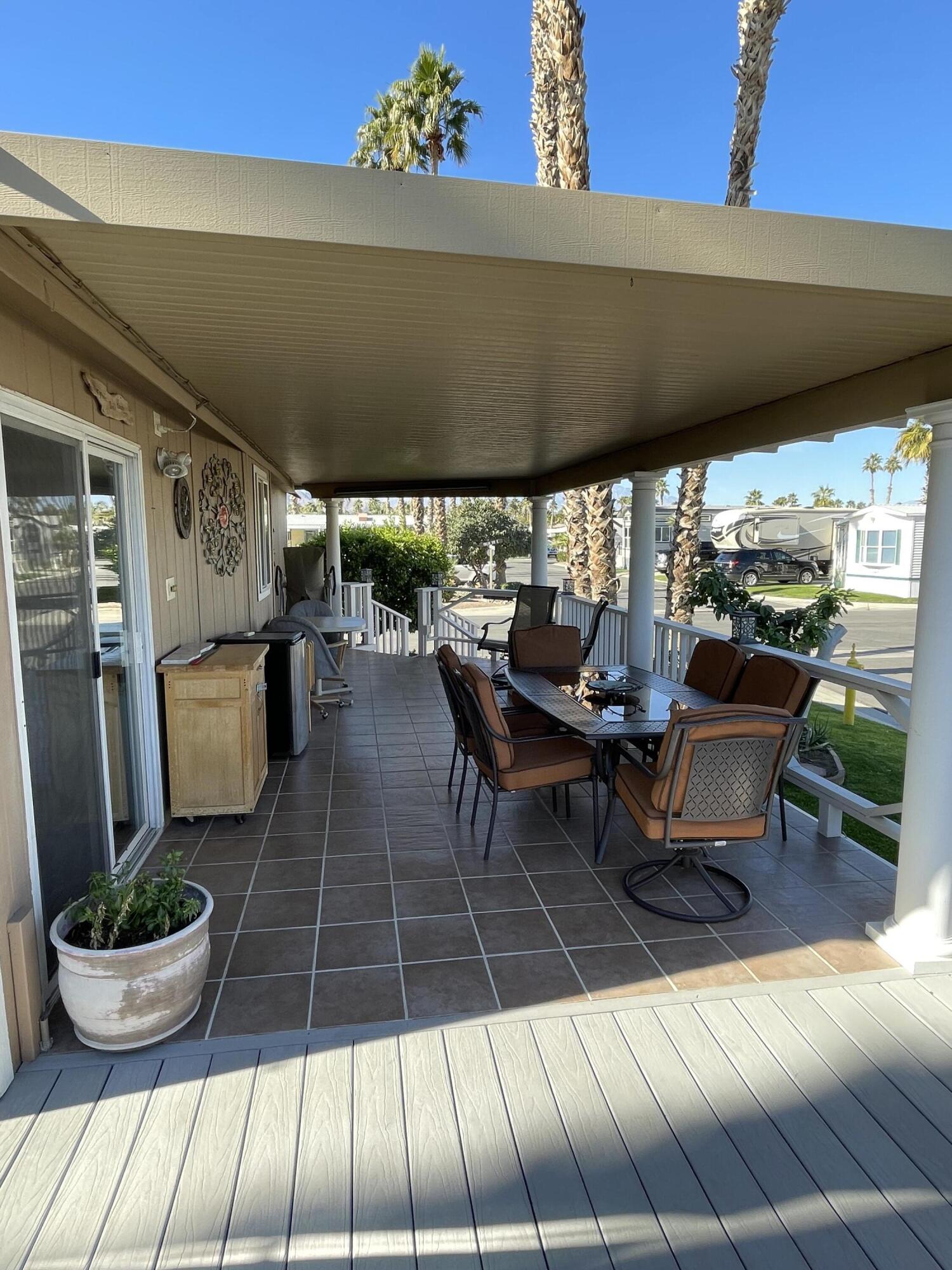 81620 Ave 49, Unit 1A Indio, CA 92201 - Photo 17 of 20 a outdoor space with chairs and couch