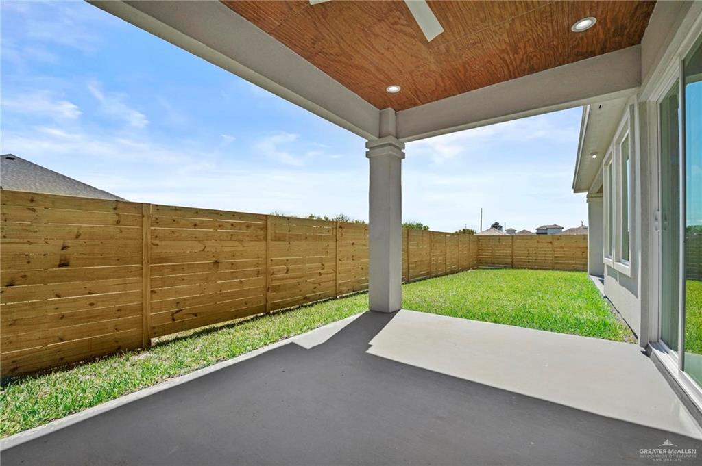 2716 East Conroe Road Edinburg, TX 78542 - Photo 28 of 31 Fenced backyard with a patio area
