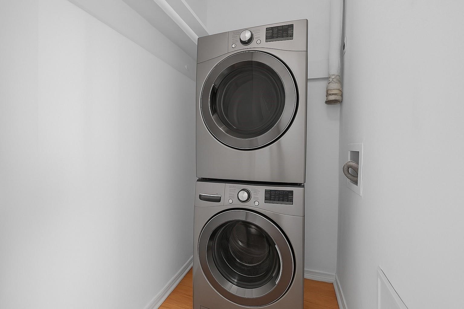 1849 Marshall Street, Unit 9 Houston, TX 77098 - Photo 16 of 22 Washer/ Dryer Staged