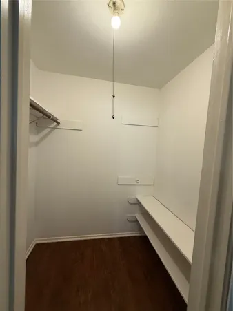 a view of small space with racks on the wall