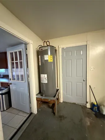 a view of a livingroom with a furniture and windows