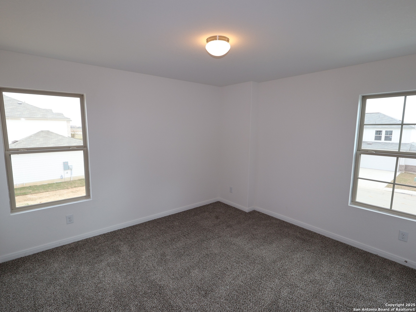 1164 Limestone Ridge Seguin, TX 78155 - Photo 12 of 45 an empty room with a window