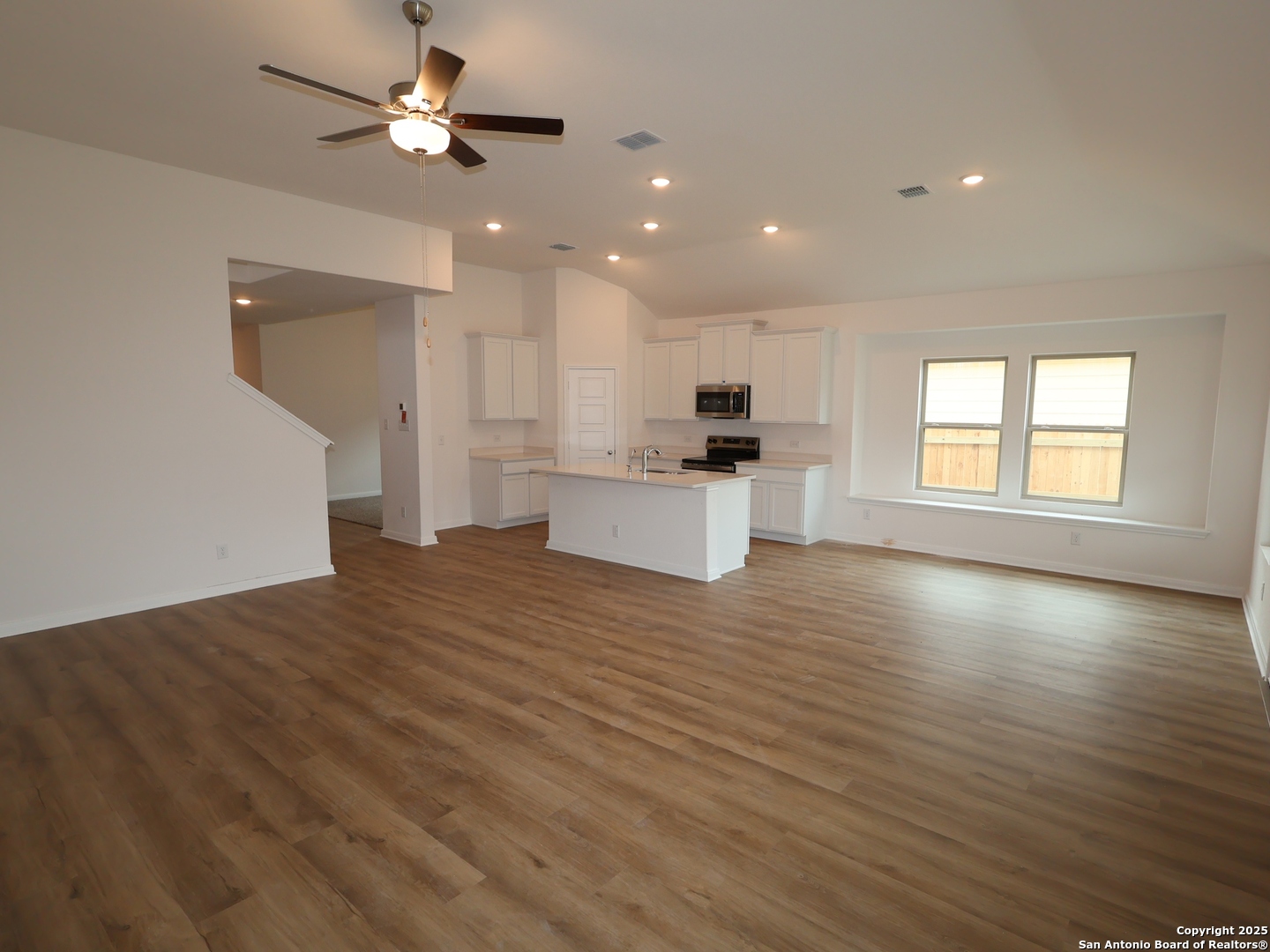 1164 Limestone Ridge Seguin, TX 78155 - Photo 4 of 45 a view of a kitchen with a sink and a window