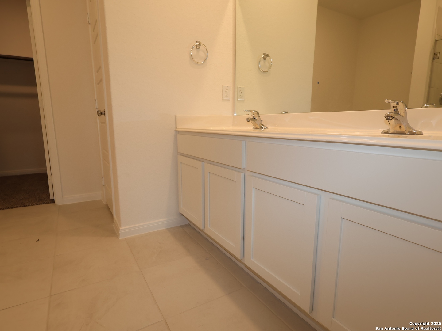 1164 Limestone Ridge Seguin, TX 78155 - Photo 8 of 45 a bathroom with a sink and a mirror