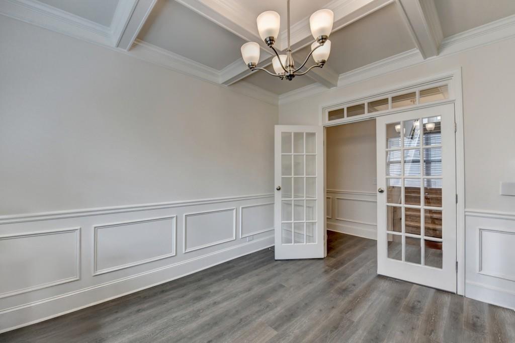 7535 Rambling Vale Dawsonville, GA 30534 - Photo 14 of 69 wooden floor in an empty room with a window