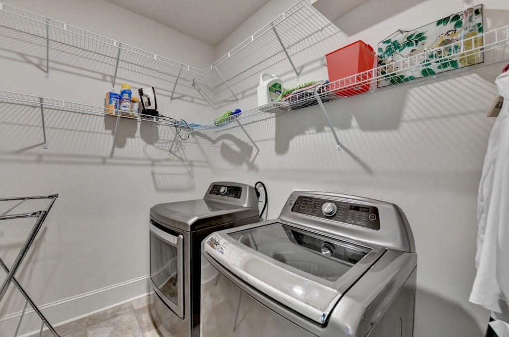7535 Rambling Vale Dawsonville, GA 30534 - Photo 28 of 69 a utility room with dryer and washer