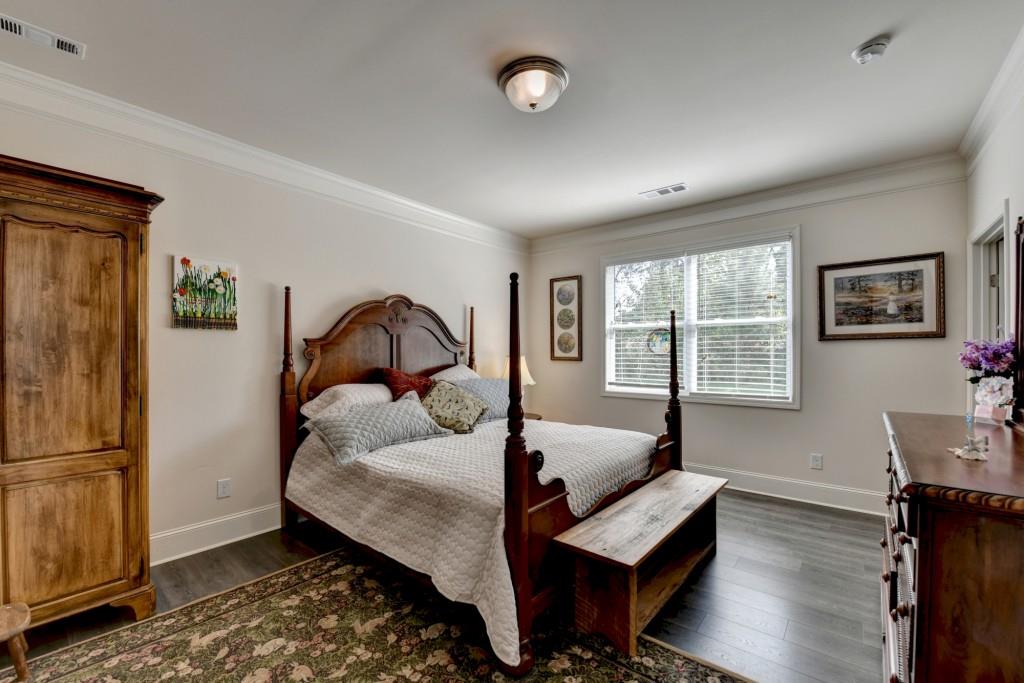 7535 Rambling Vale Dawsonville, GA 30534 - Photo 35 of 69 a bedroom with furniture and a window