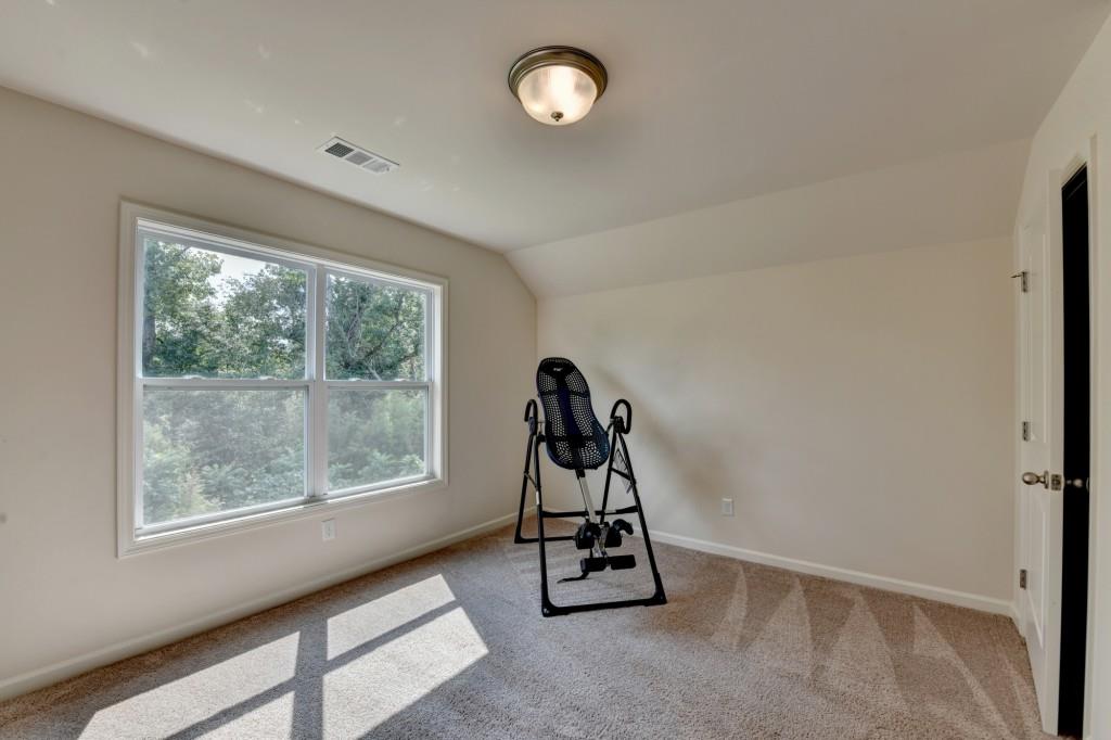 7535 Rambling Vale Dawsonville, GA 30534 - Photo 53 of 69 a view of workspace with window and gym cycle