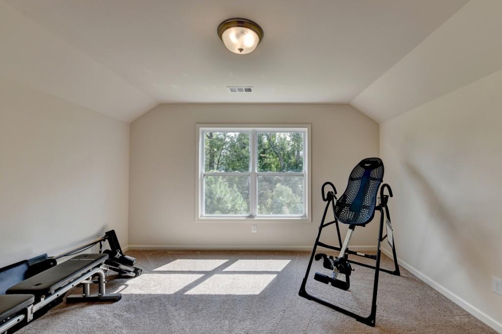 7535 Rambling Vale Dawsonville, GA 30534 - Photo 54 of 69 a view of room with gym equipment and a window