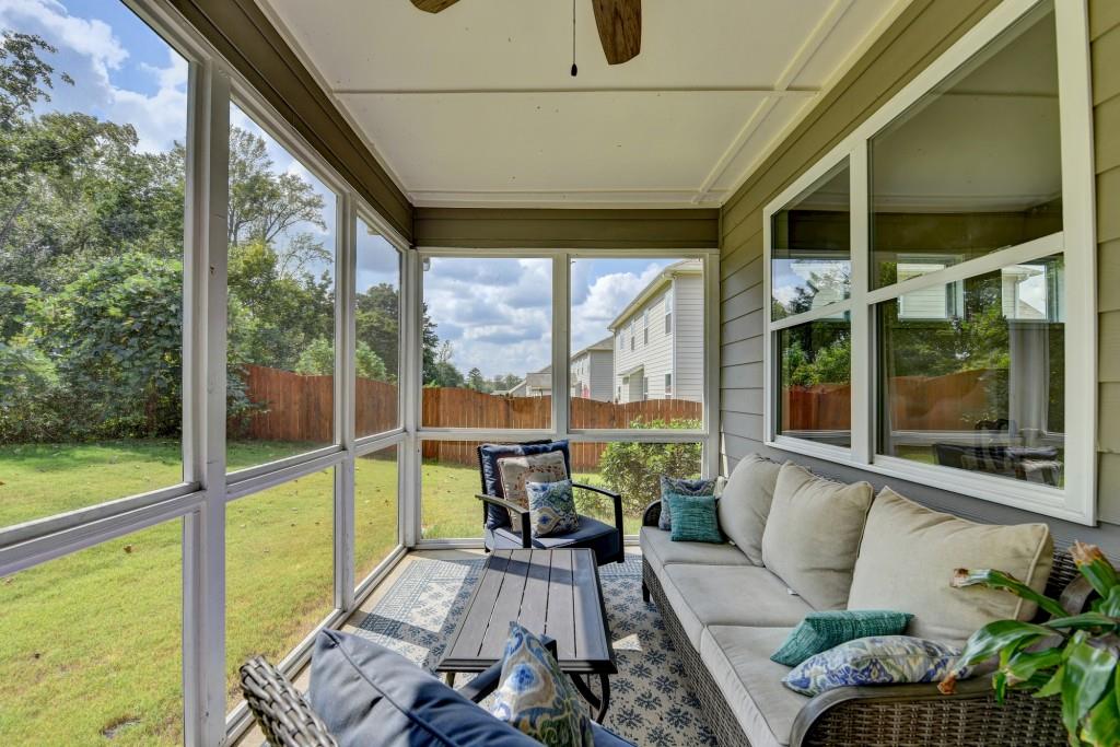 7535 Rambling Vale Dawsonville, GA 30534 - Photo 57 of 69 a living room with large windows