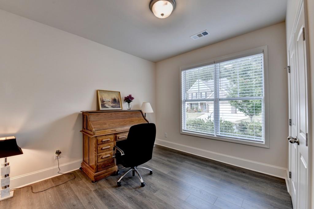 7535 Rambling Vale Dawsonville, GA 30534 - Photo 6 of 69 a view of workspace with wooden floor workspace
