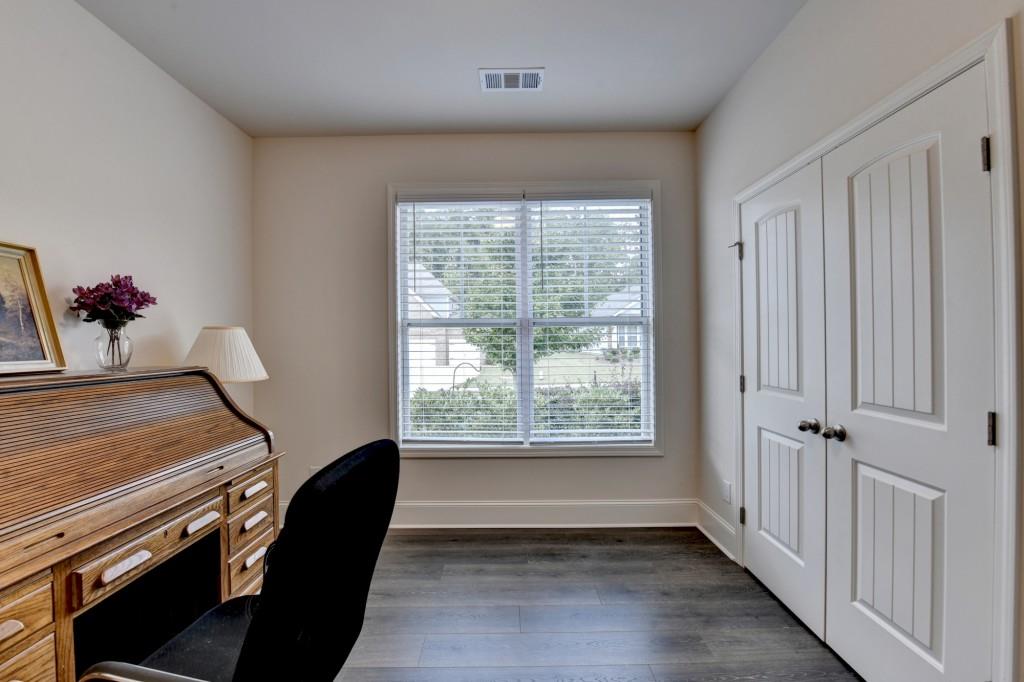 7535 Rambling Vale Dawsonville, GA 30534 - Photo 7 of 69 a view of an empty room with a window