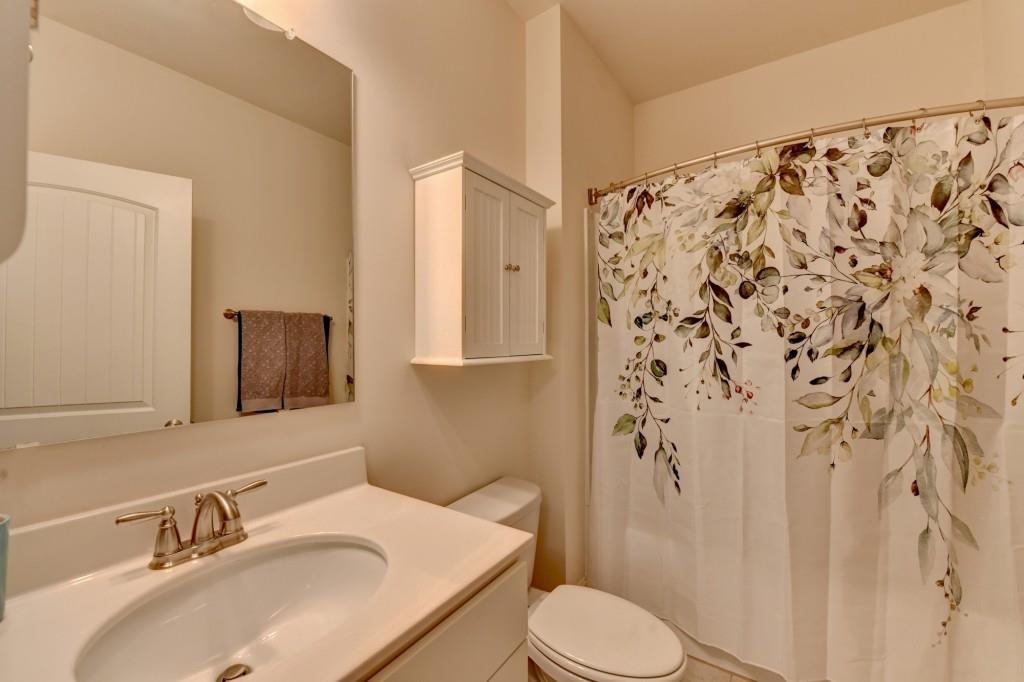 7535 Rambling Vale Dawsonville, GA 30534 - Photo 10 of 69 a bathroom with a sink toilet and shower