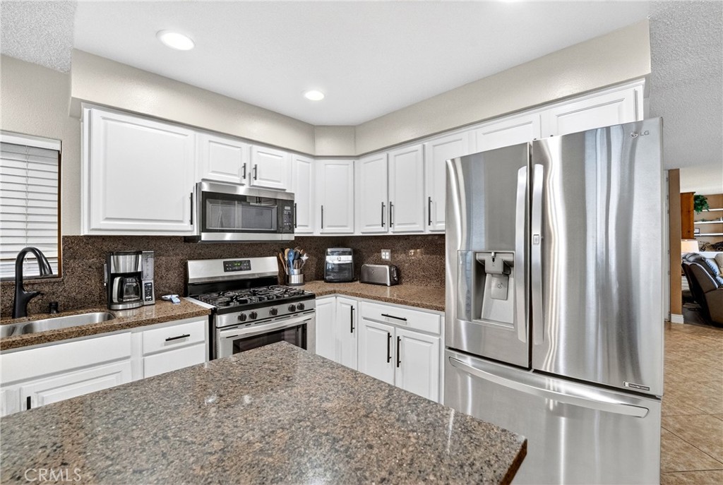 2501 East Avenue R4 Palmdale, CA 93550 - Photo 16 of 40 Kitchen is ready to make beautiful memories.