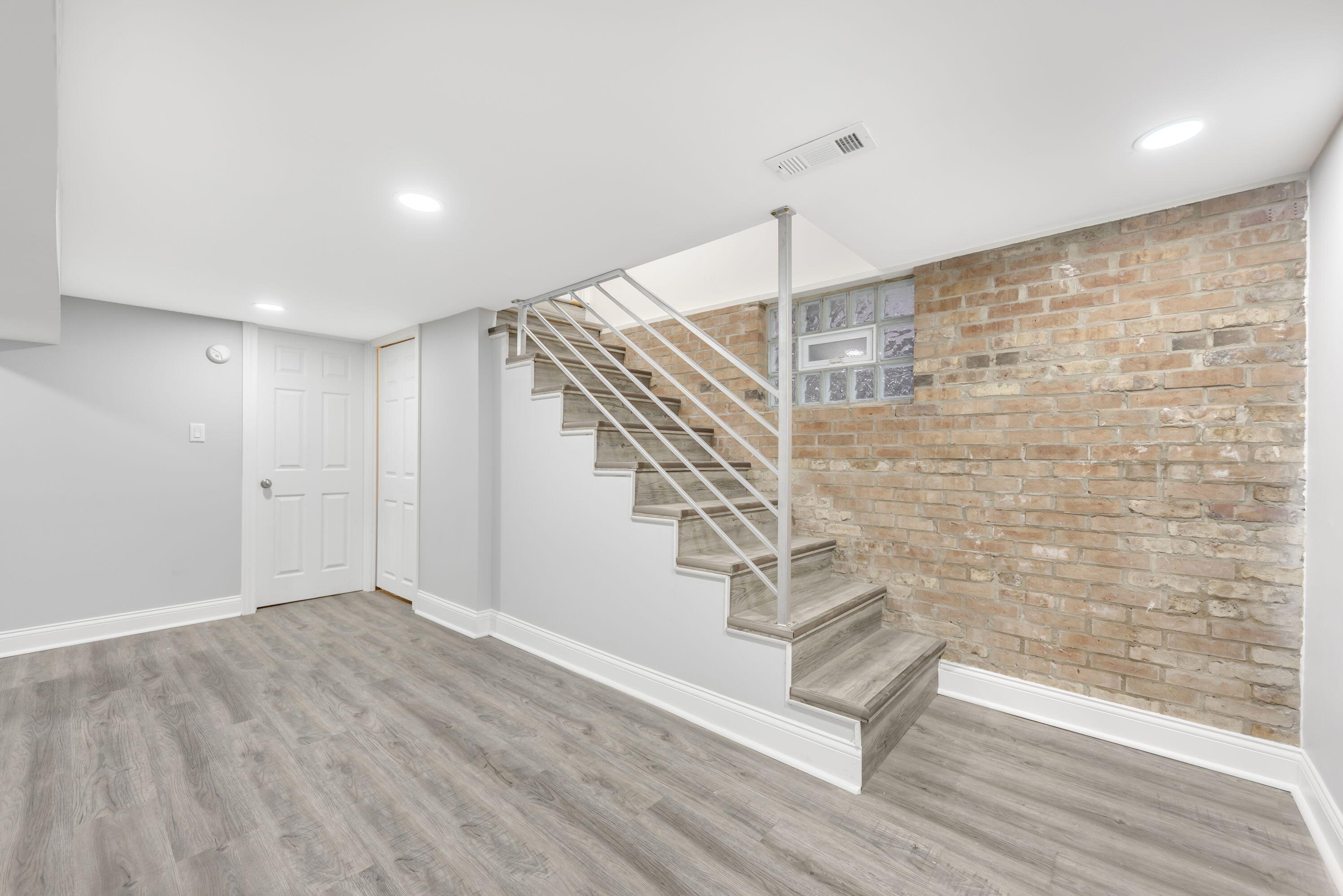 552 Harrison Street Gary, IN 46402 - Photo 13 of 14 a view of entryway with wooden floor