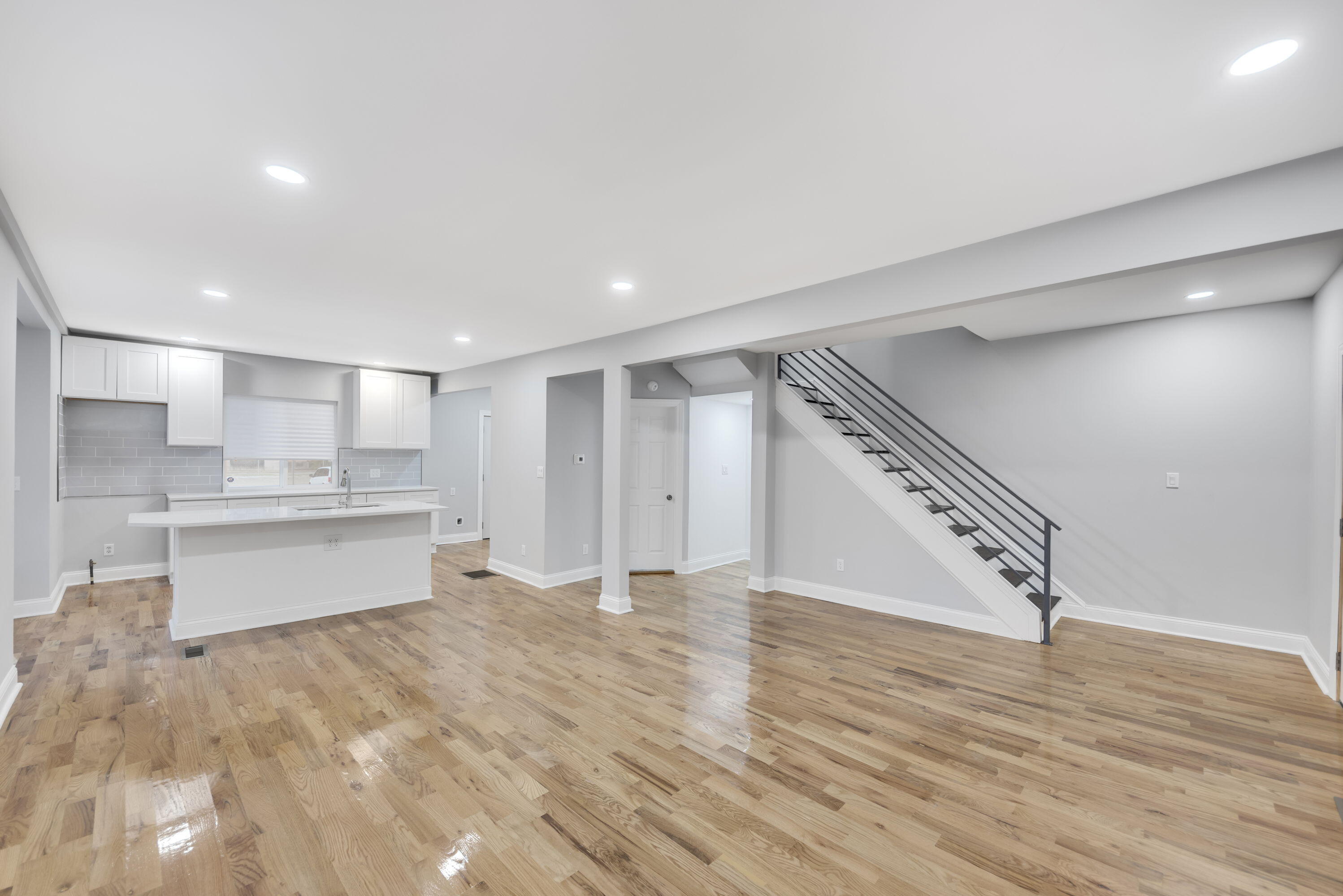 552 Harrison Street Gary, IN 46402 - Photo 3 of 14 a view of kitchen with wooden floor and electronic appliances