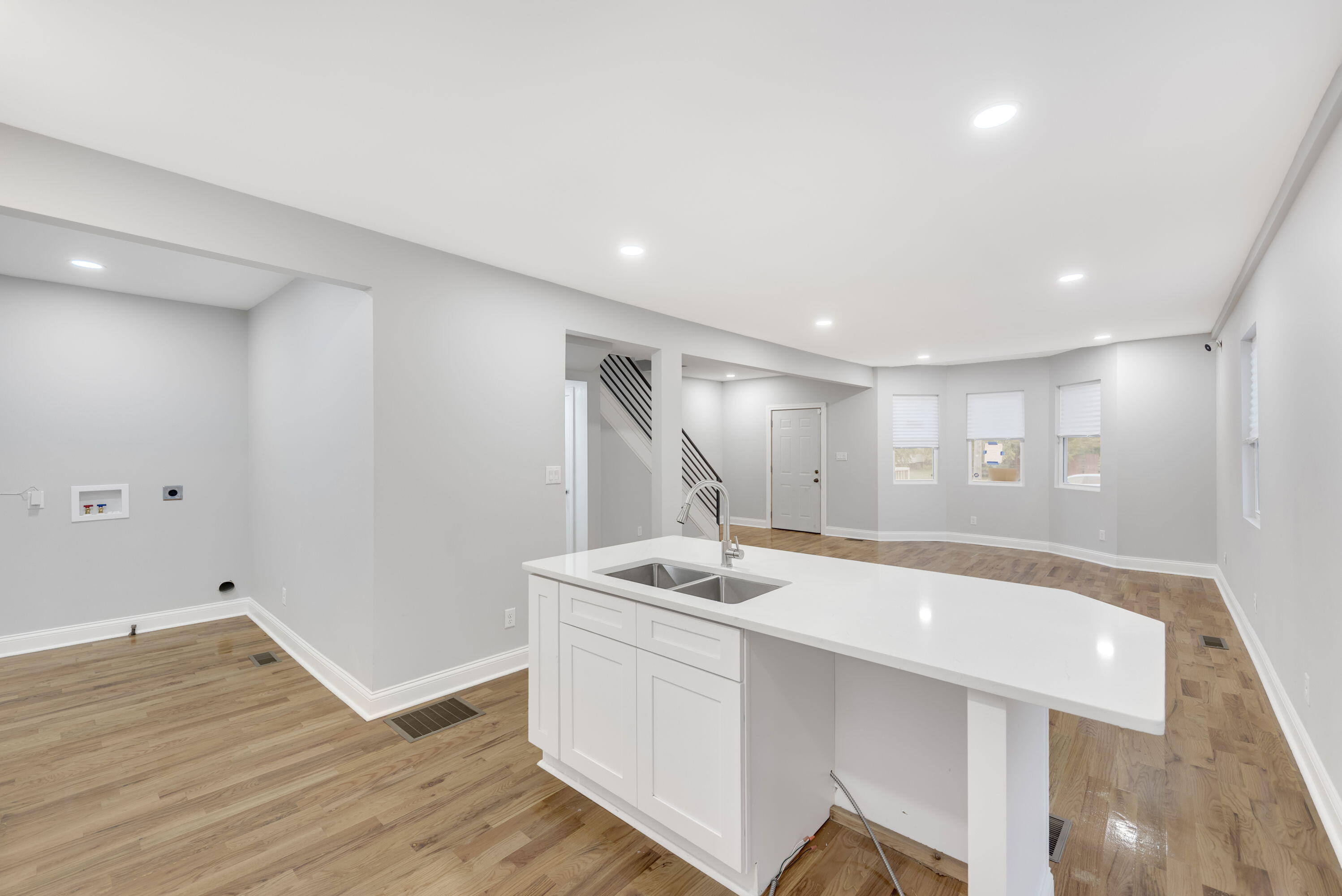 552 Harrison Street Gary, IN 46402 - Photo 5 of 14 a spacious bathroom with a granite countertop sink