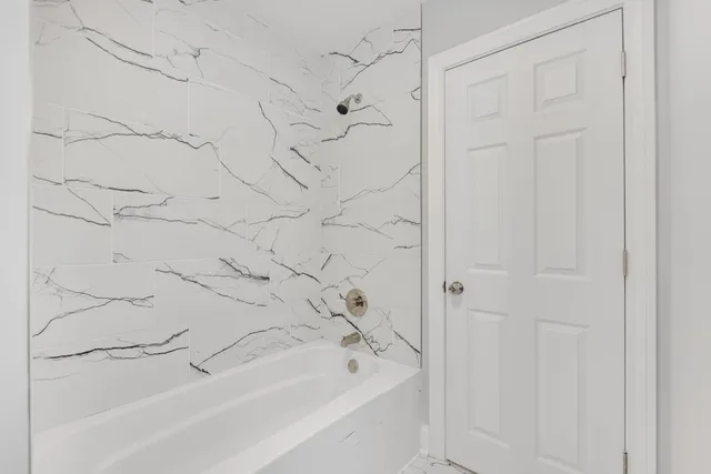 a bathroom with a bathtub