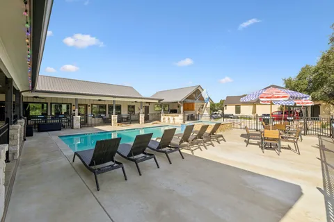 a view of a forest with a house