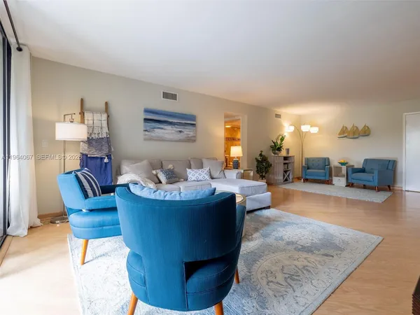 a view of a house with a yard and plants