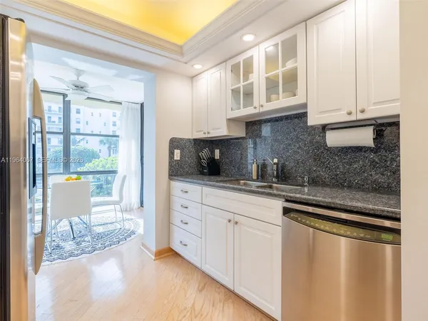 a spacious bedroom with a bed and a couch