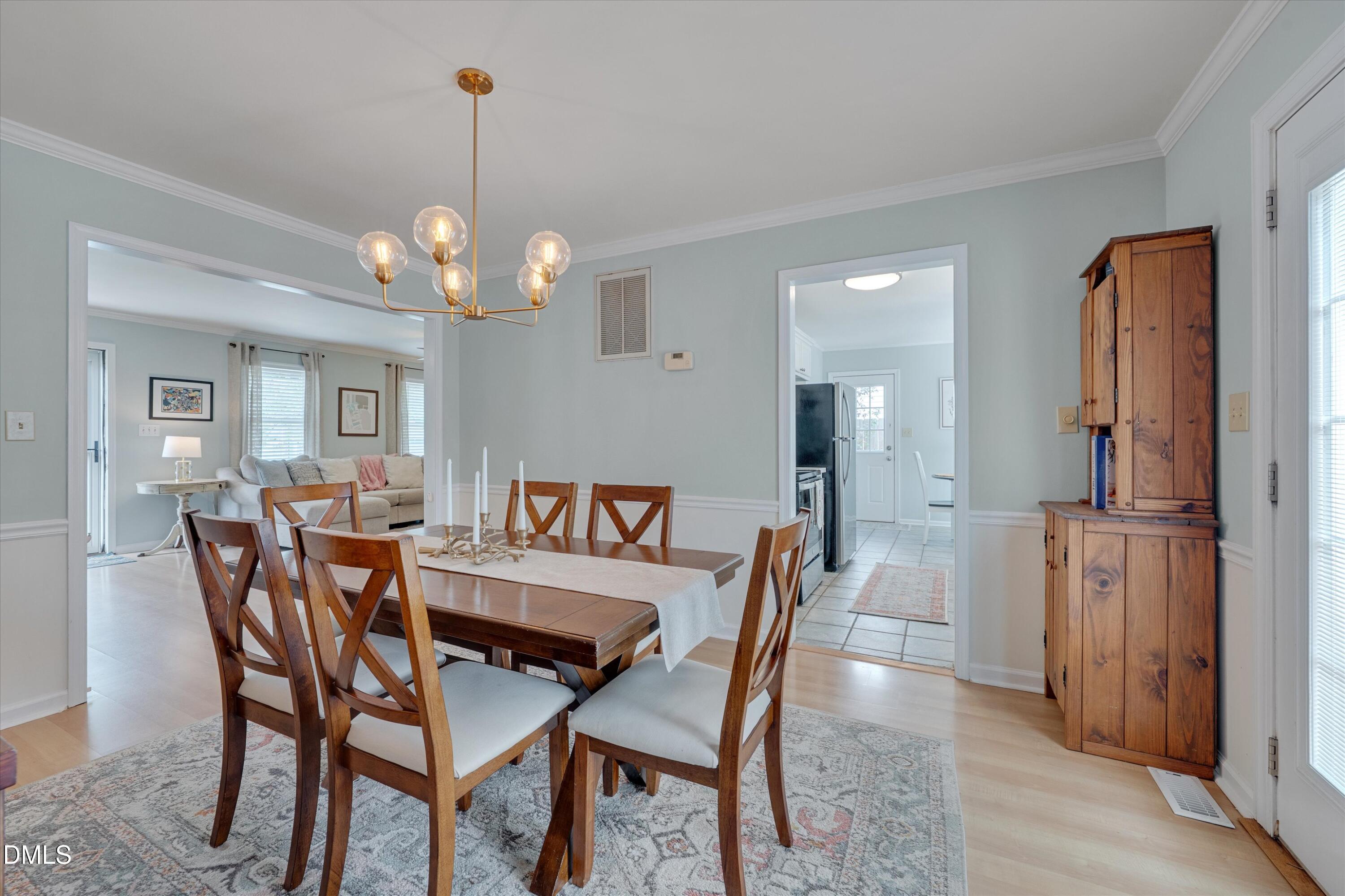 3301 Lassiter Street Durham, NC 27707 - Photo 11 of 32 a dining room with furniture and window