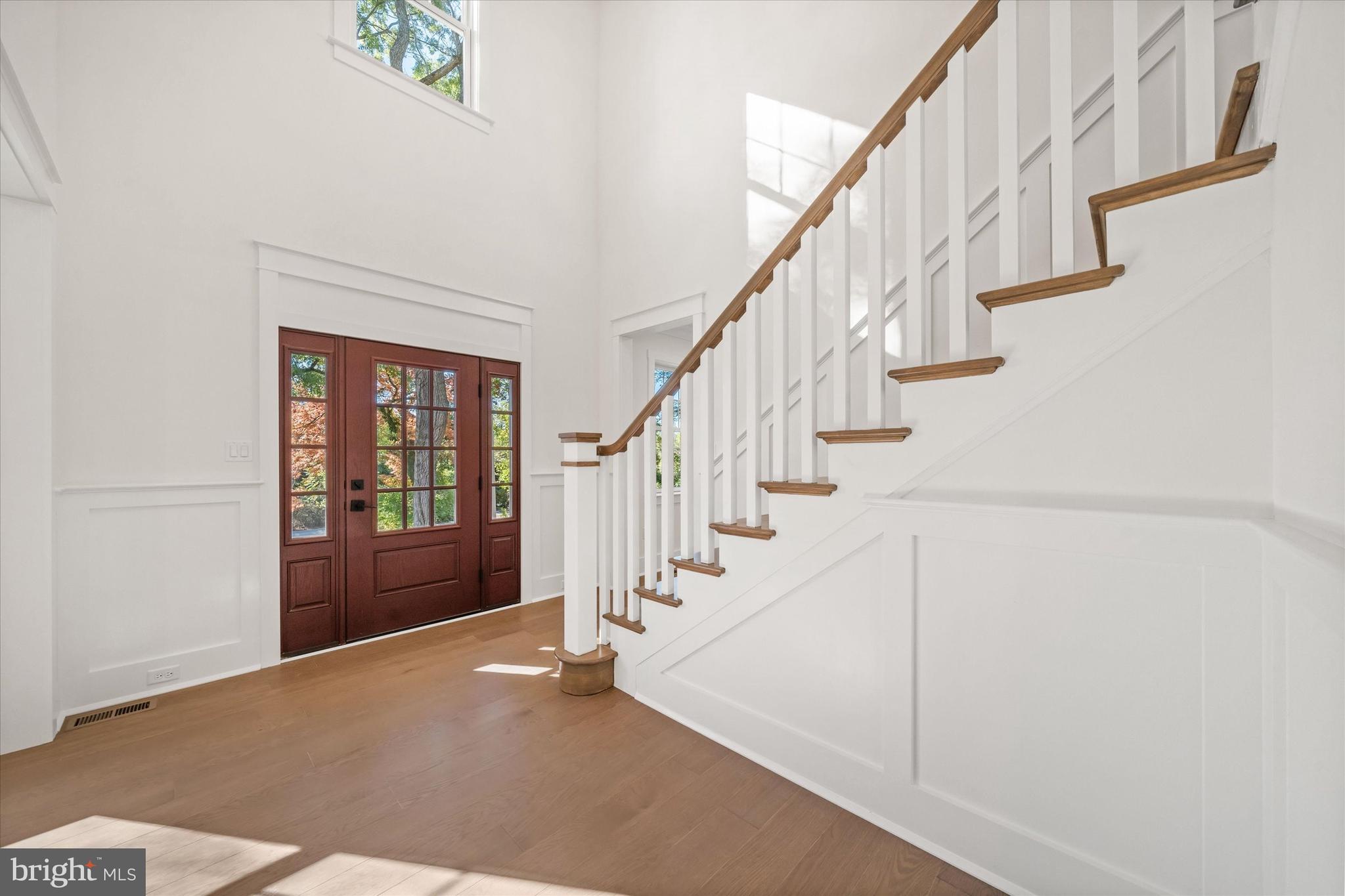 567 Southwood Road Hockessin, DE 19707 - Photo 3 of 54 a view of entryway and hall with wooden floor