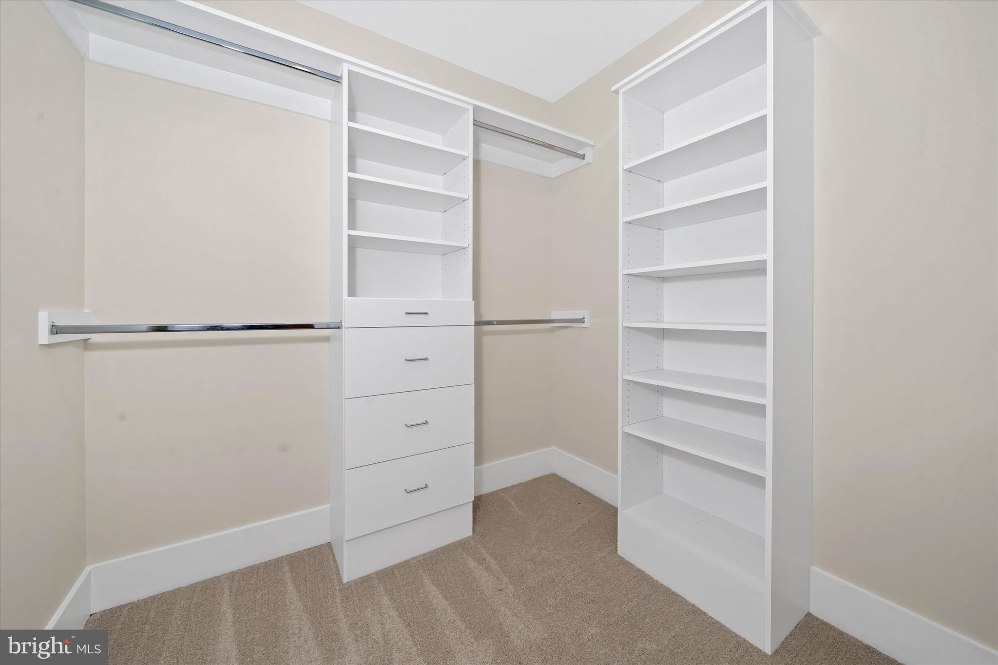 567 Southwood Road Hockessin, DE 19707 - Photo 33 of 54 a view of walk in closet with empty racks