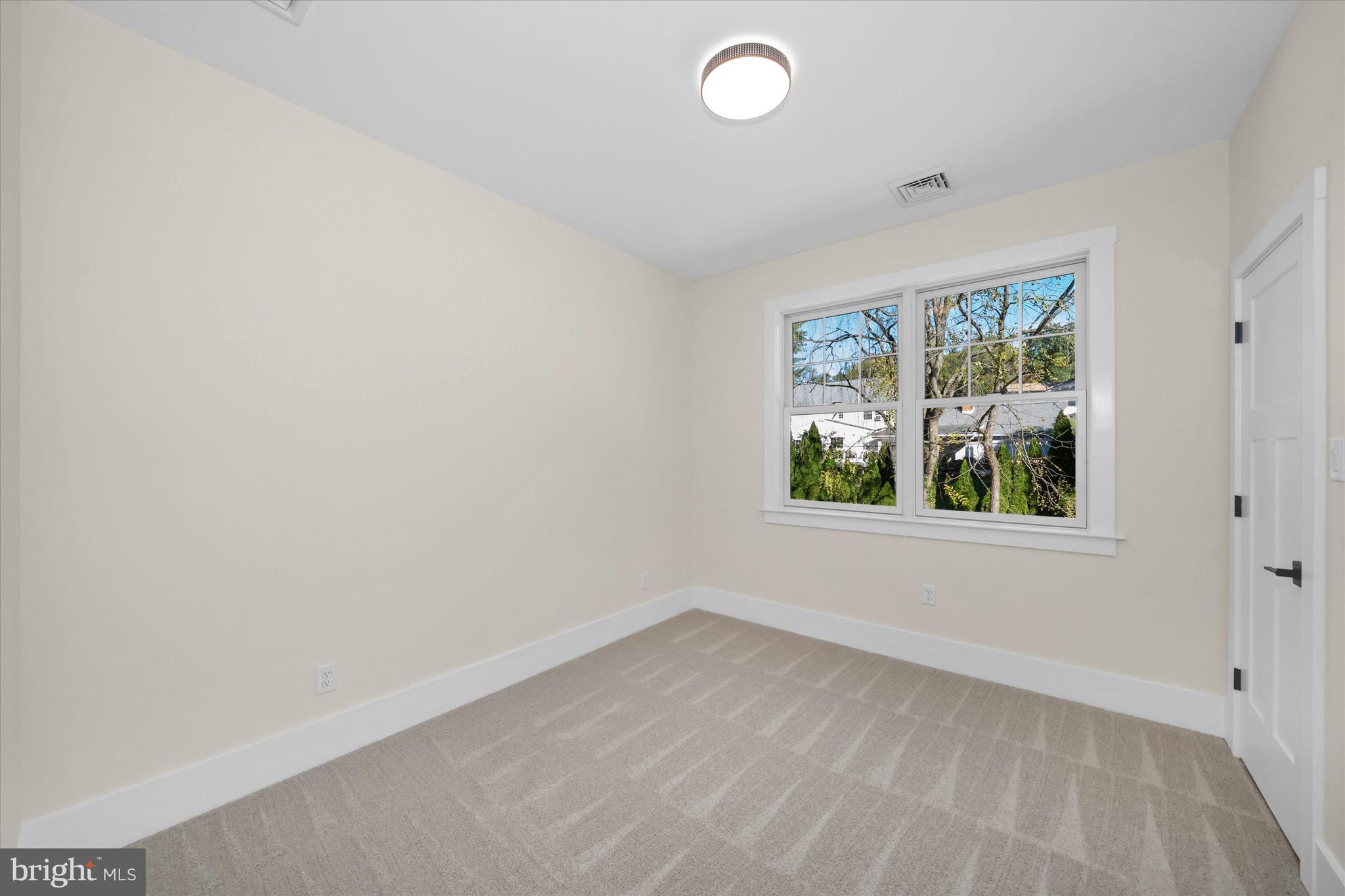 567 Southwood Road Hockessin, DE 19707 - Photo 36 of 54 an empty room with a window