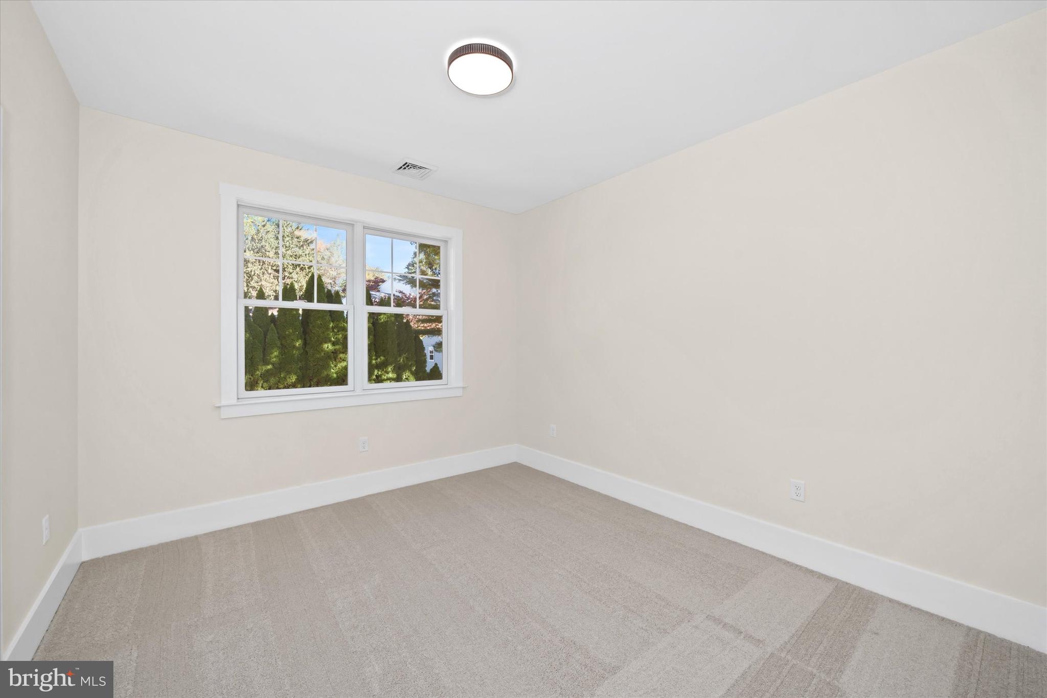 567 Southwood Road Hockessin, DE 19707 - Photo 38 of 54 an empty room with a window