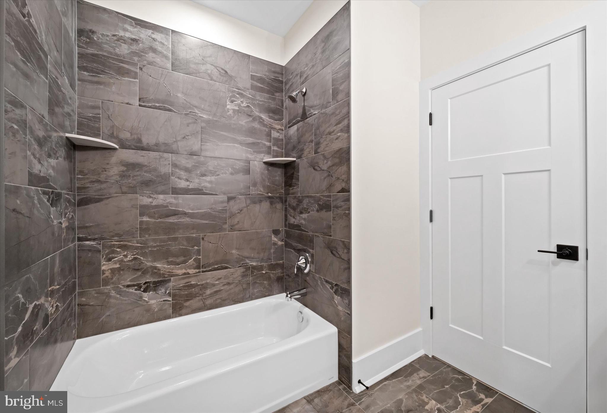 567 Southwood Road Hockessin, DE 19707 - Photo 42 of 54 a bathroom with a bathtub