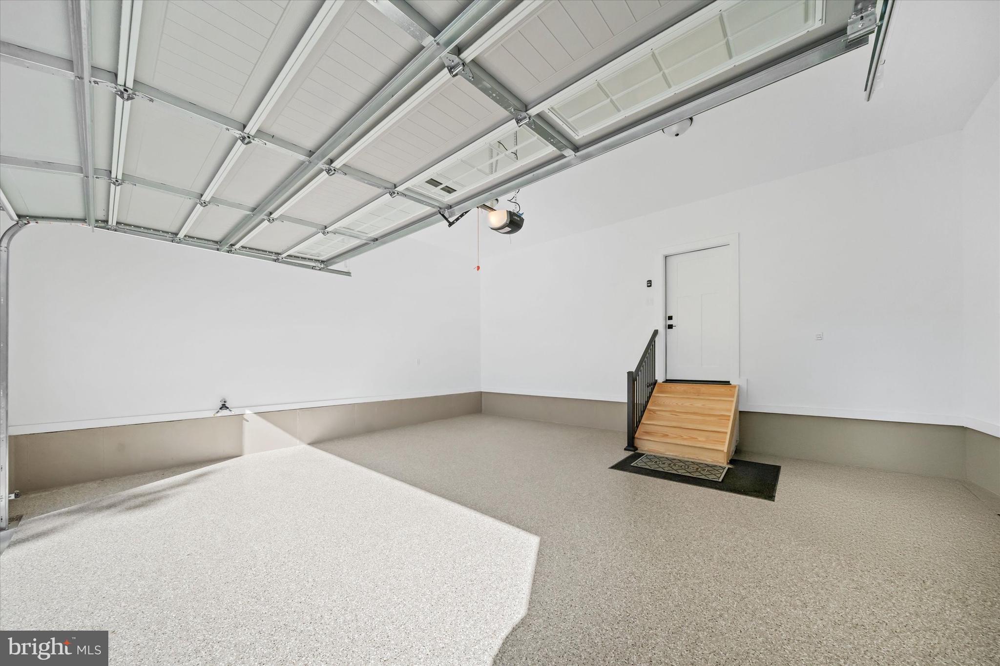 567 Southwood Road Hockessin, DE 19707 - Photo 45 of 54 a room with wooden floor and white walls