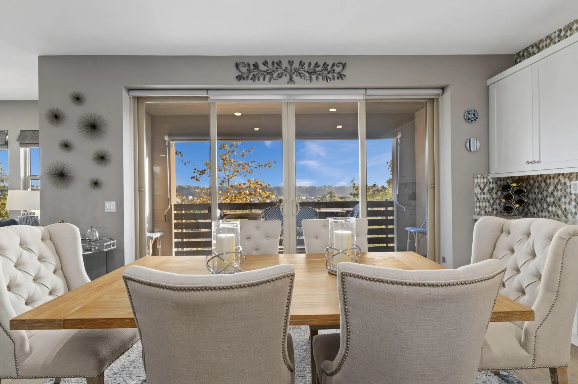 8347 Ridge Court San Diego, CA 92108 - Photo 11 of 63 a living room with furniture and a glass door