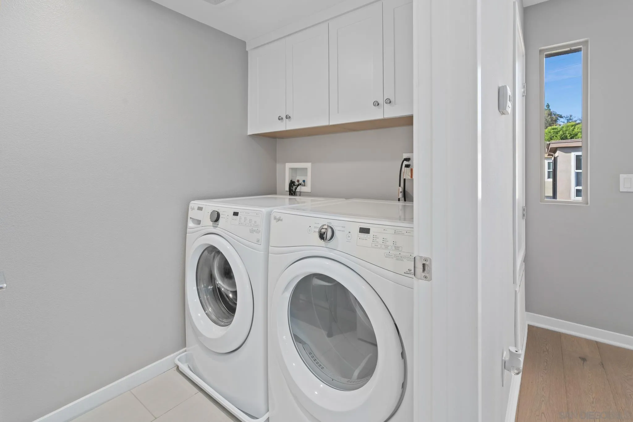 8347 Ridge Court San Diego, CA 92108 - Photo 18 of 63 a view of storage and utility room with washer and dryer