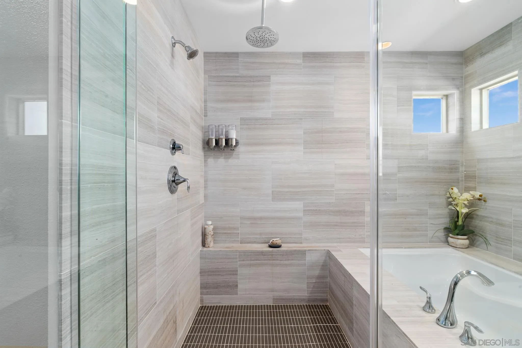 8347 Ridge Court San Diego, CA 92108 - Photo 24 of 63 a bathroom with a sink and shower