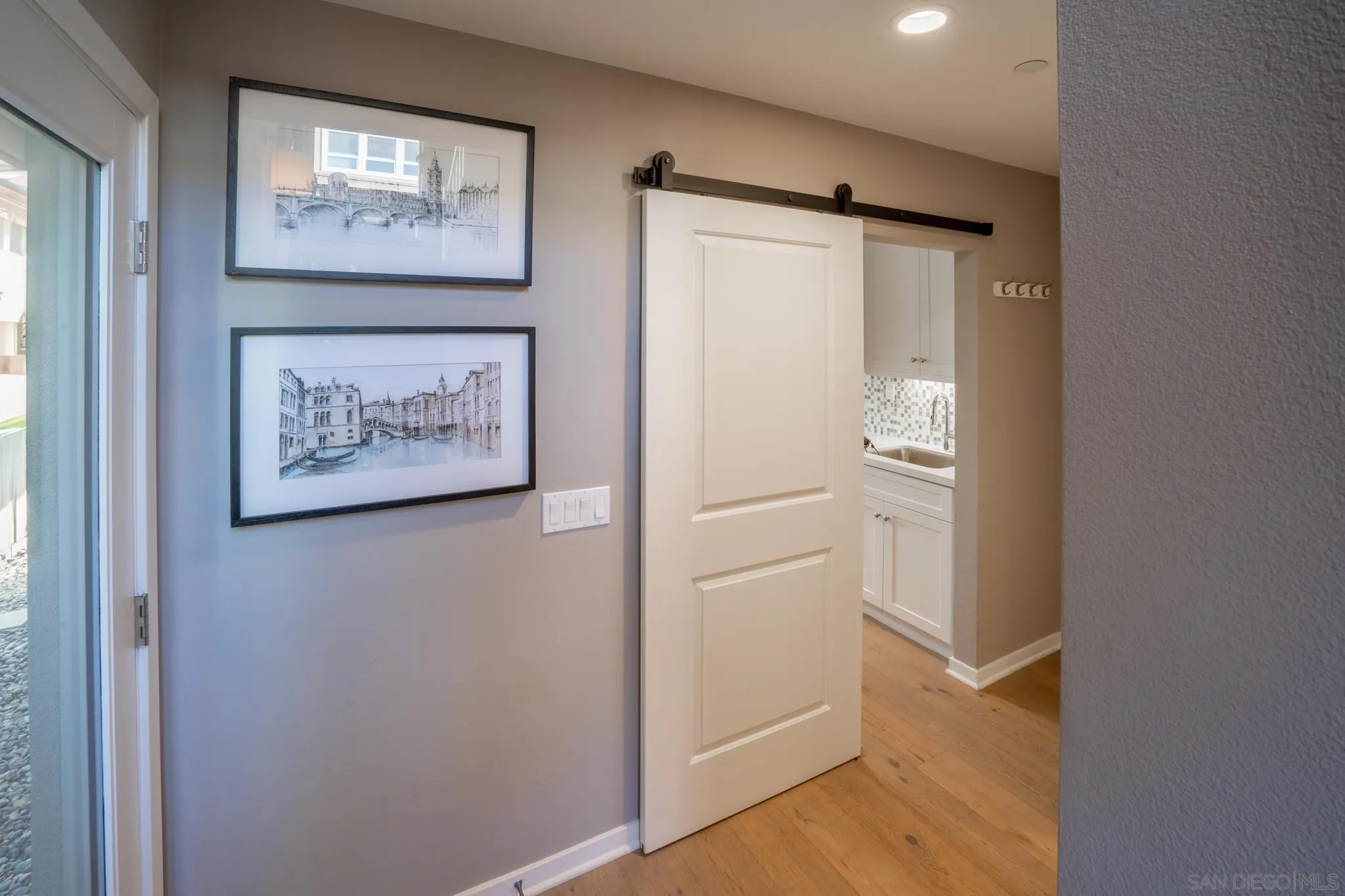 8347 Ridge Court San Diego, CA 92108 - Photo 26 of 63 a view of a hallway with wooden floor