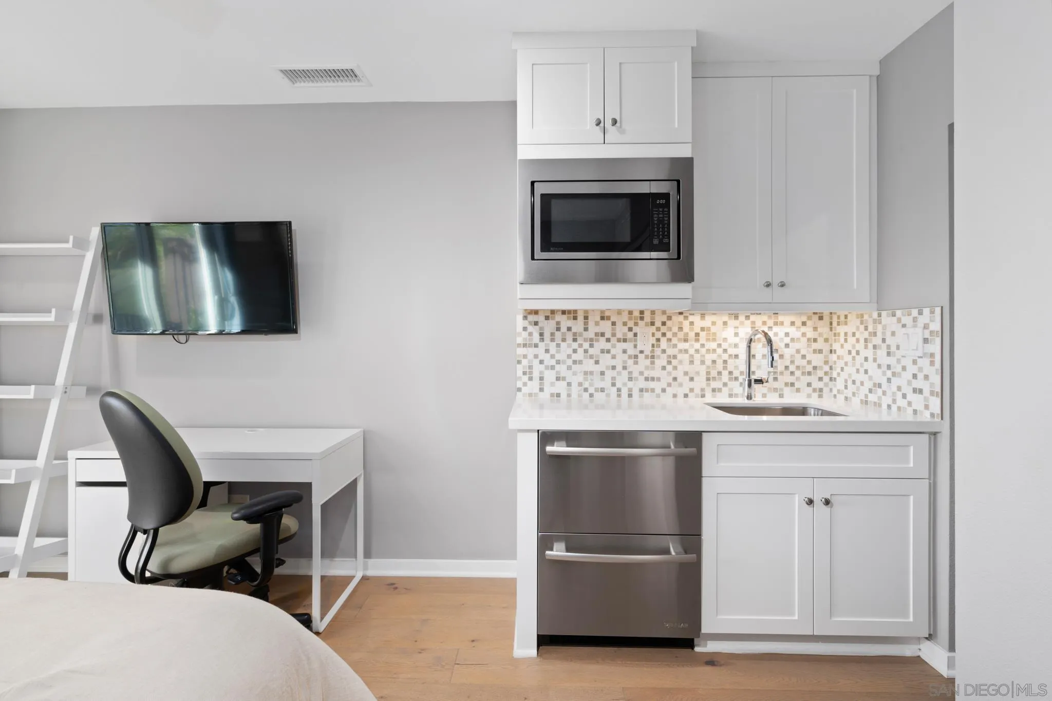 8347 Ridge Court San Diego, CA 92108 - Photo 29 of 63 a kitchen with a sink and a microwave