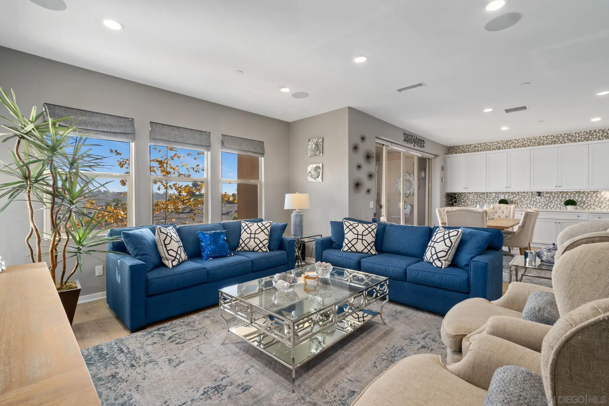 8347 Ridge Court San Diego, CA 92108 - Photo 3 of 63 a living room with furniture wooden floor and a large window