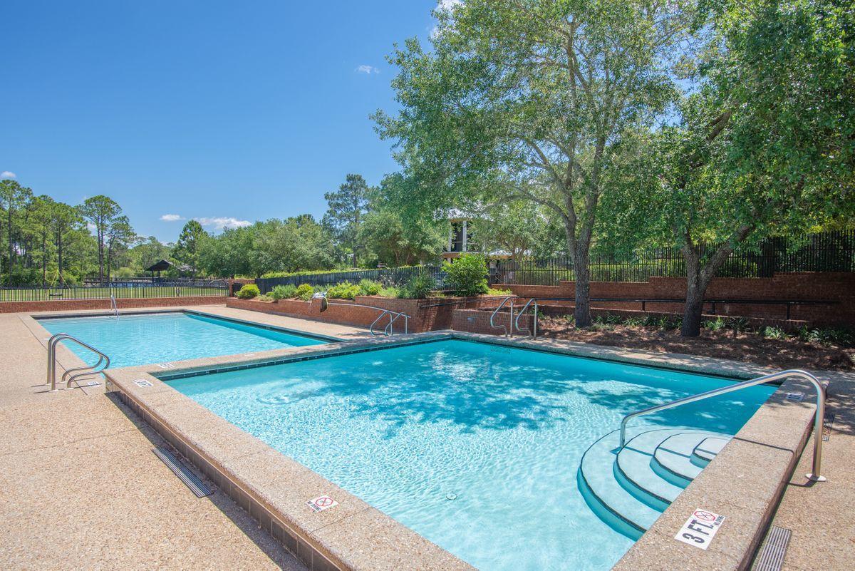 Lot 47 Pontchartrain N Santa Rosa Beach Santa Rosa Beach, FL 32459 - Photo 8 of 21 a view of a swimming pool with a patio and a yard