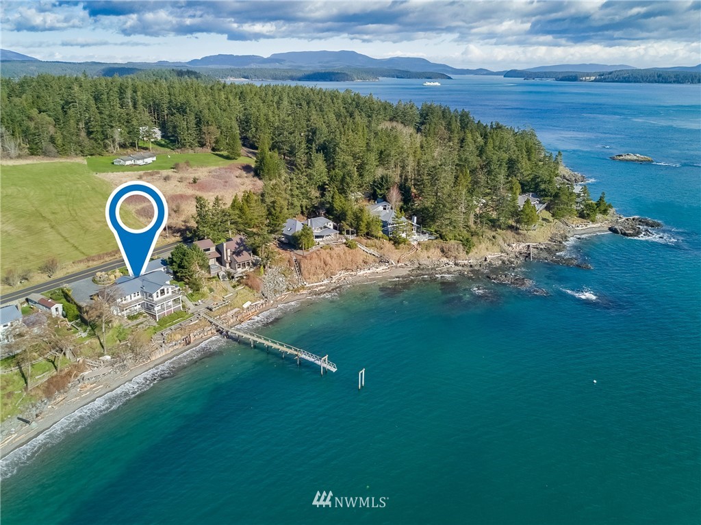 3051 Pear Point Road Friday Harbor, WA 98250 - Photo 2 of 39 a view of a golf course with a lake