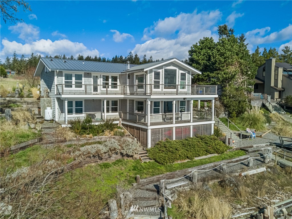 3051 Pear Point Road Friday Harbor, WA 98250 - Photo 4 of 39 a house view with a garden space