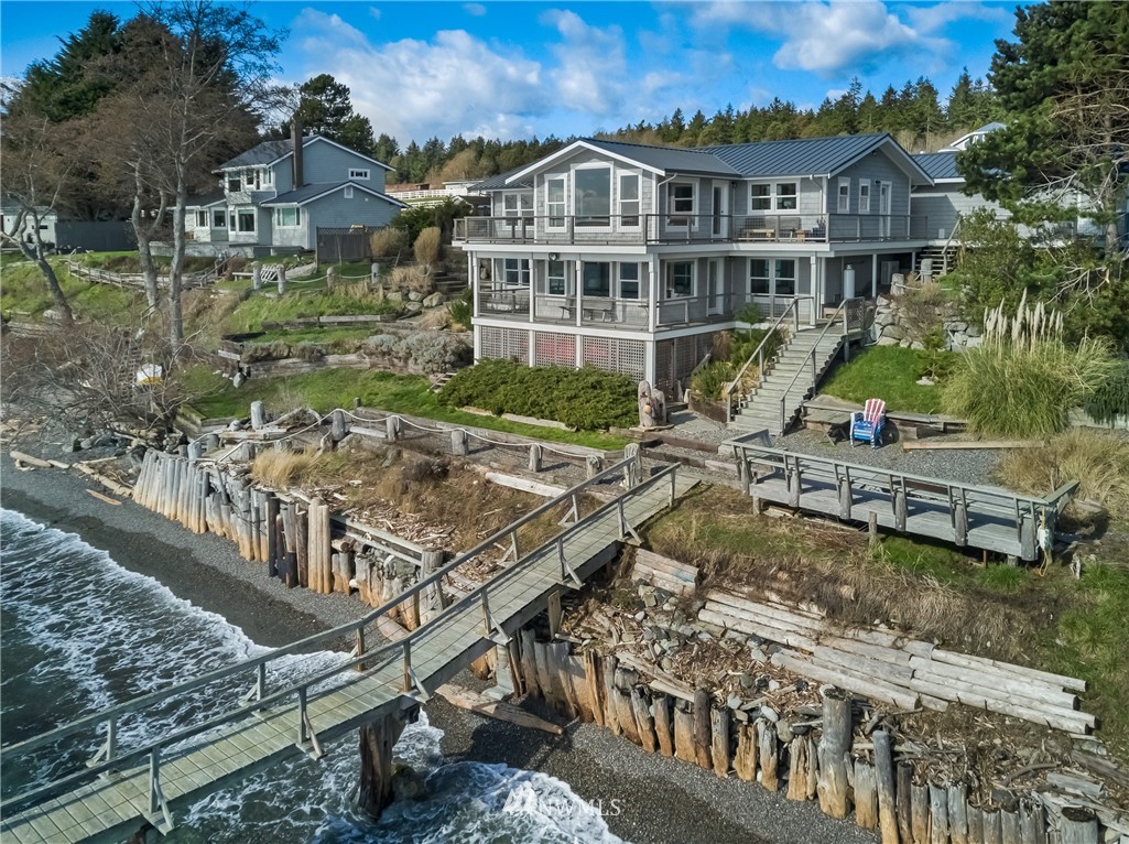 3051 Pear Point Road Friday Harbor, WA 98250 - Photo 8 of 39 a view of a house with roof deck