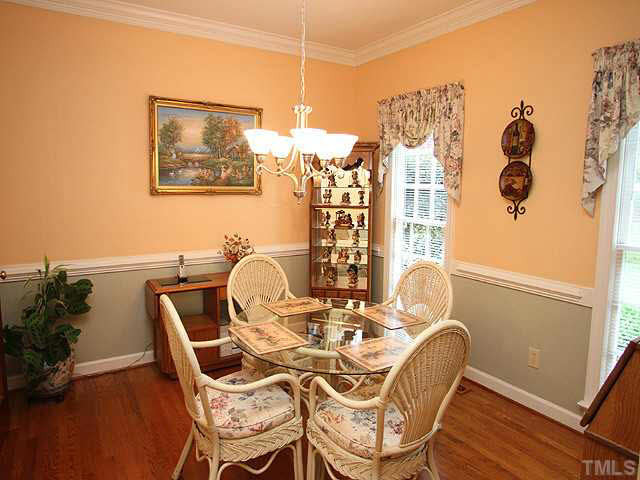 4020 Ridgebrook Bluffs Drive Raleigh, NC 27603 - Photo 4 of 14 A more formal dining area with hardwoods. Dining Room